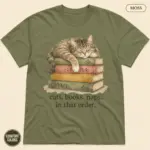 Moss garment-dyed Comfort Colors t-shirt with funny cats books and naps bookworm cat illustration, front view