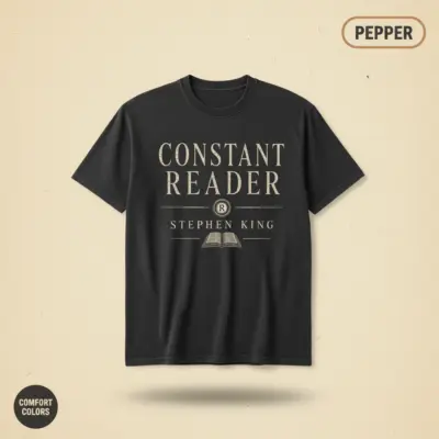 Pepper Comfort Colors t-shirt with "Constant Reader" Stephen King typographic print – front studio view on garment-dyed cotton