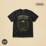 Pepper Comfort Colors t-shirt with vintage badge graphic reading Constant Readers Society Est 1974 – Stephen King horror book club design, front view