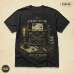 Pepper Comfort Colors t-shirt with vintage Gothic typewriter dark academia illustration -- front view on studio background