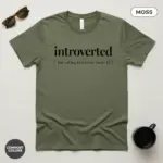 introverted but willing to discuss books bookish garment dyed t shirt funny reader tee flatlay moss