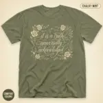 Chalky Mint Comfort Colors garment-dyed t-shirt printed with the Pride and Prejudice opening quote by Jane Austen, studio frontal view
