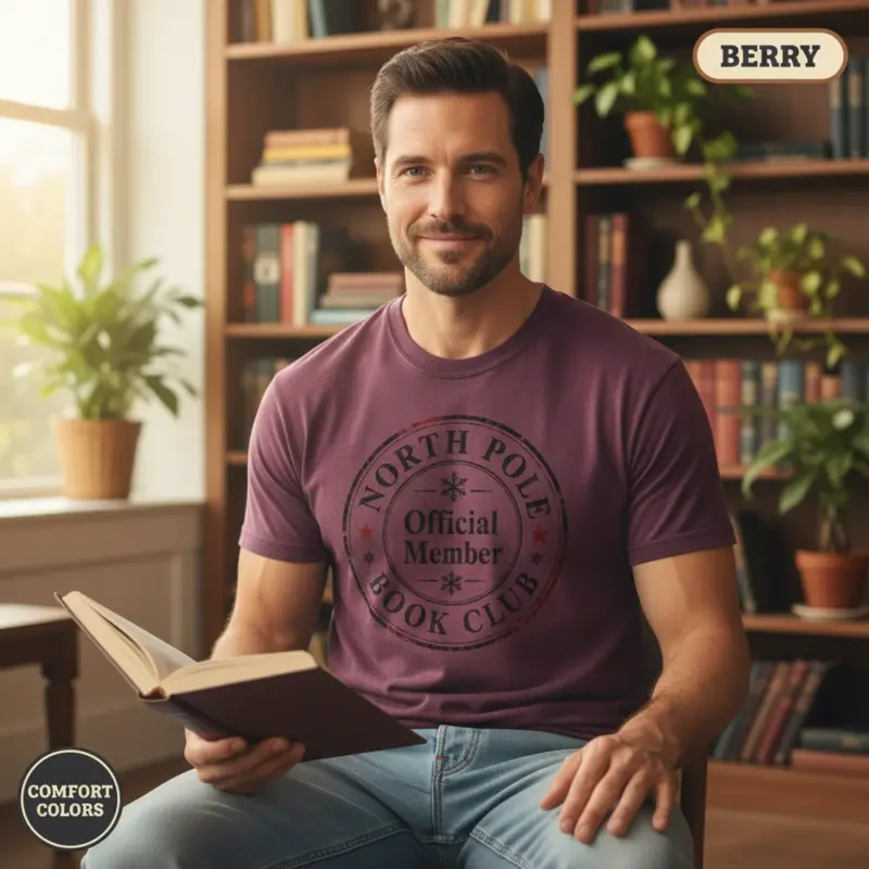 north pole book club christmas bookish gift garment dyed t shirt holiday reader tee mature male berry