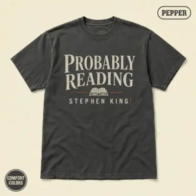 Pepper Comfort Colors t-shirt with "Probably Reading Stephen King" bold typography print -- front view, studio shot
