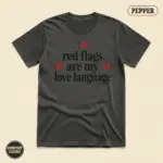 Pepper Comfort Colors garment-dyed t-shirt with bold typographic phrase Red Flags Are My Love Language dark romance bookish humor front chest graphic