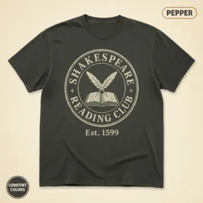 Pepper Comfort Colors garment-dyed t-shirt with vintage distressed Shakespeare Reading Club badge graphic, front view on studio background