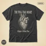 Pepper garment-dyed Comfort Colors tee featuring Gothic typography and anatomical heart illustration referencing Edgar Allan Poe's Tell-Tale Heart