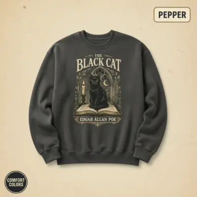 Pepper garment-dyed crewneck sweatshirt with woodcut black cat graphic and gothic Edgar Allan Poe typography on front chest