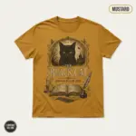 Mustard Comfort Colors garment-dyed t-shirt with Gothic black cat illustration referencing Edgar Allan Poe's 1843 short story, front chest center print